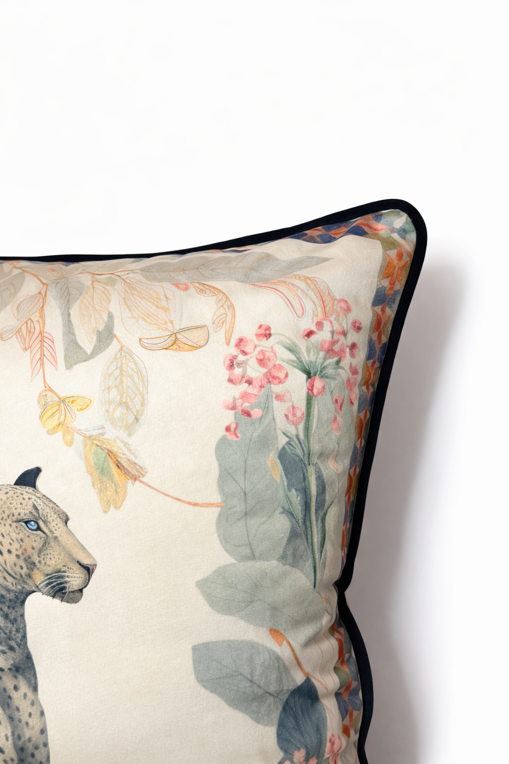 Beige velvet cushion cover with reclining cheetah and botanical floral illustration