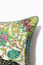 Mint green velvet cushion cover with zebra and leopard among botanical flowers