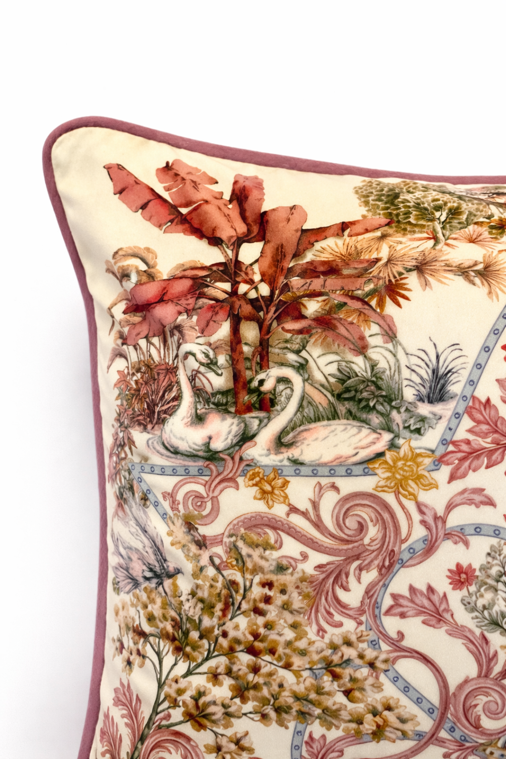 Square blush pink and cream velvet cushion cover with botanical and animal print, featuring elephants, swans and a tiger, finished with dusty pink piping.