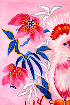 Square pink velvet cushion cover featuring illustrated cockatoos, floral motifs and red tassel corners