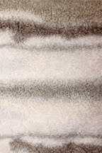 Beige faux shearling cushion with soft striped texture