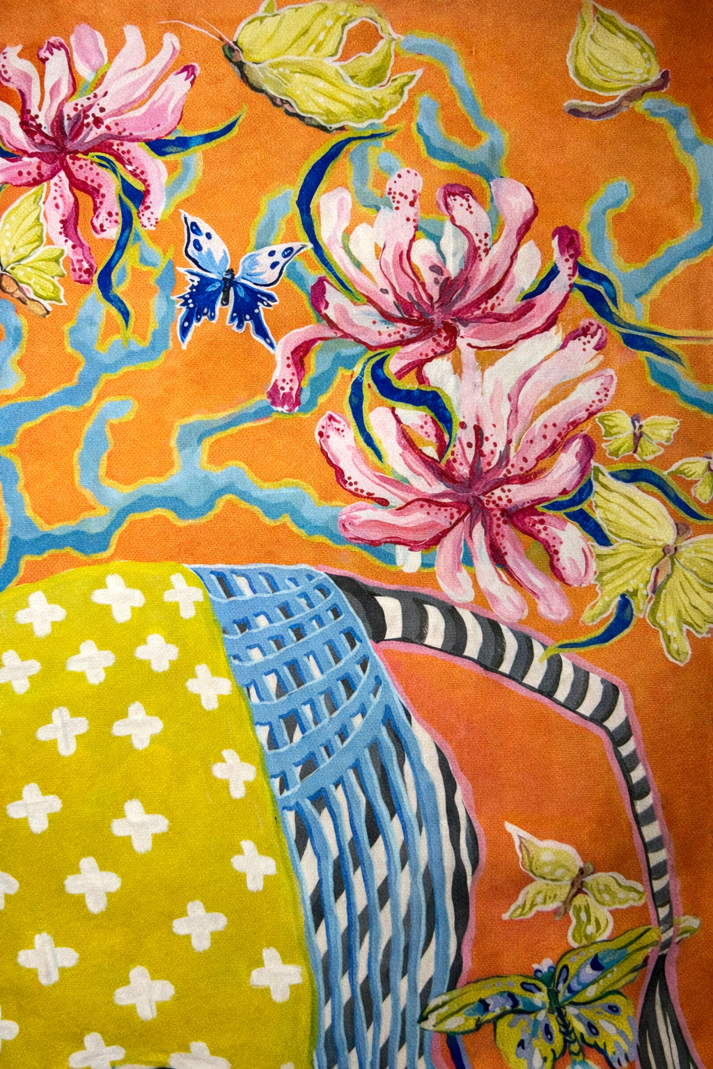 Orange velvet cushion cover with illustrated zebra, floral motifs and blue tassels, square decorative cushion.