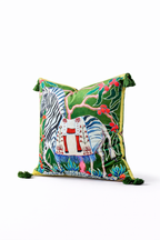 Green velvet cushion cover with illustrated zebra, decorative saddle and corner tassels