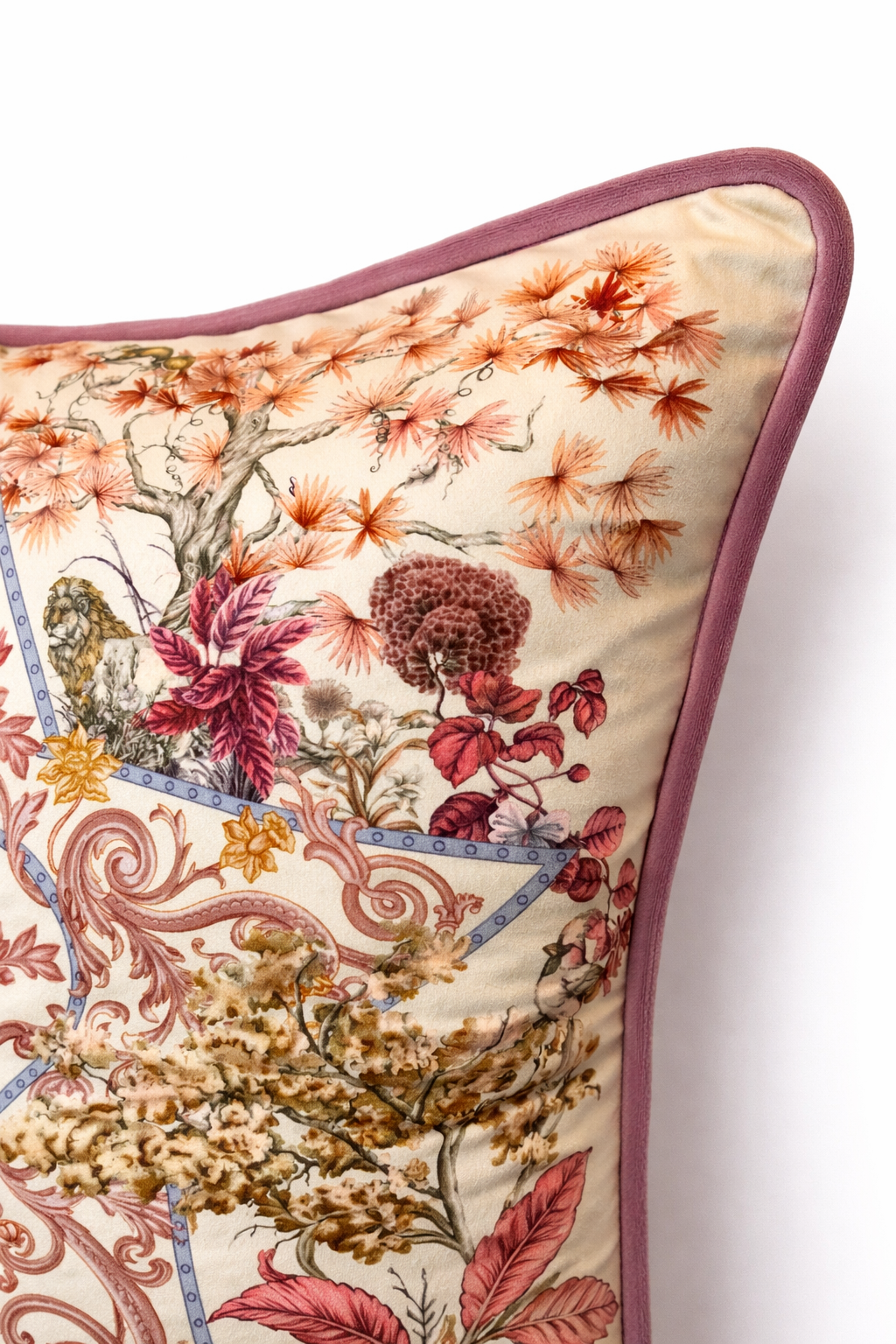 Square blush pink and cream velvet cushion cover with botanical and animal print, featuring elephants, swans and a tiger, finished with dusty pink piping.
