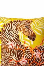 Yellow velvet cushion cover with illustrated zebra, floral branches, snake motif and pink corner tassels
