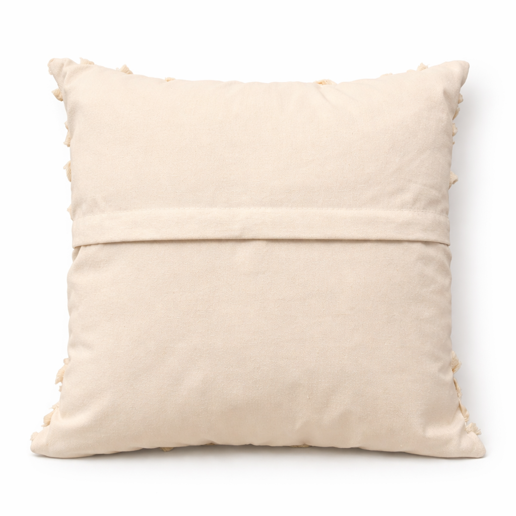 Ivory square cushion with concentric circular design appliqué and layered stitched pattern