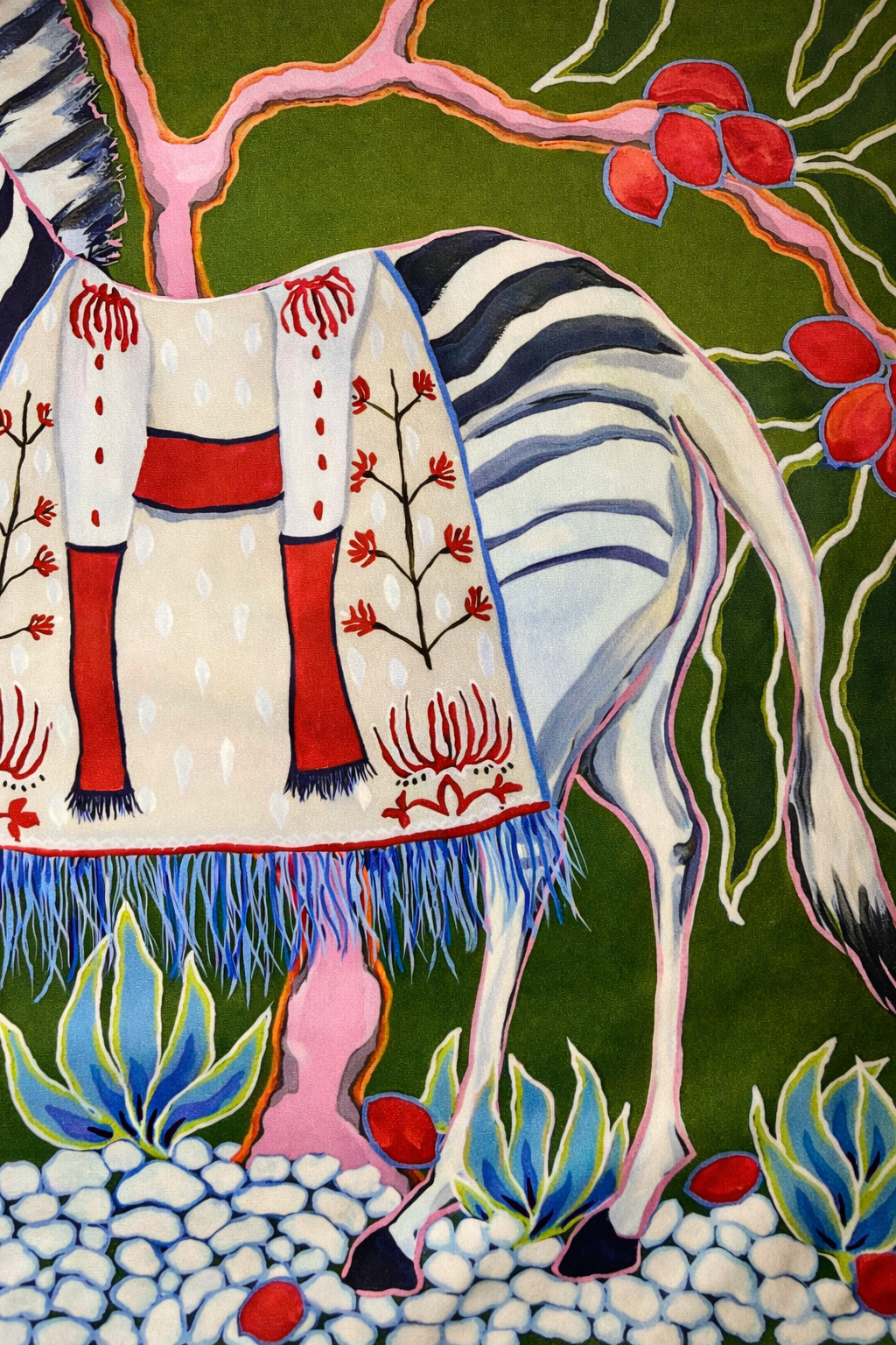 Green velvet cushion cover with illustrated zebra, decorative saddle and corner tassels