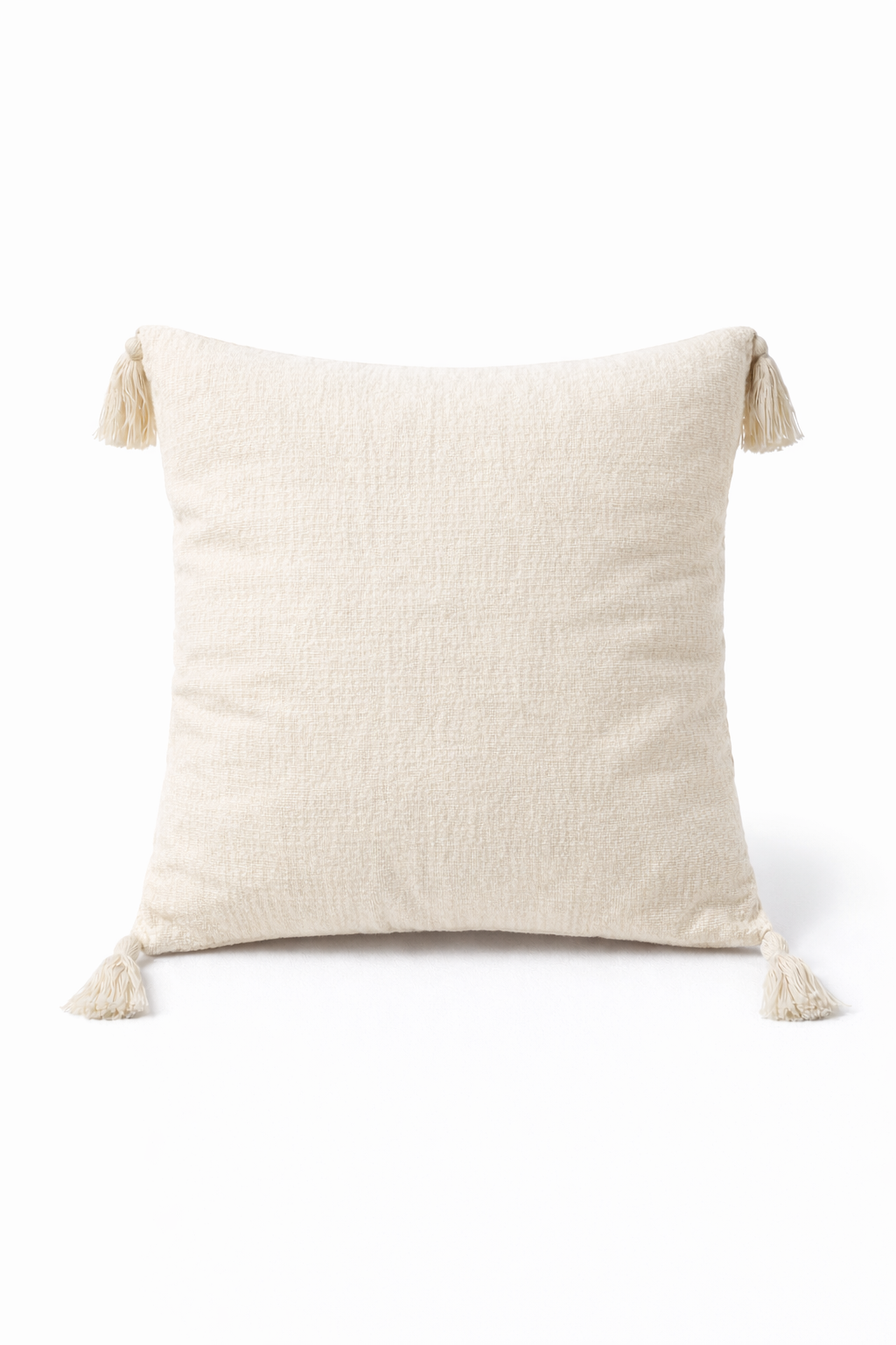 Beige square cushion with raised diamond tufted bands and tassel corners