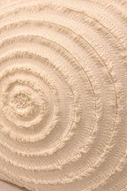 Ivory square cushion with concentric circular design appliqué and layered stitched pattern