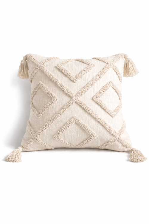 Beige square cushion with raised diamond tufted pattern and tassel corners