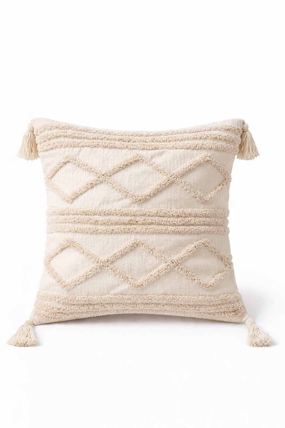 Beige square cushion with raised diamond tufted bands and tassel corners