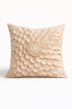 Beige velvet square cushion cover with layered floral appliqué texture and sculpted petal detailing.