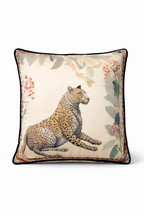 Beige velvet cushion cover with reclining cheetah and botanical floral illustration