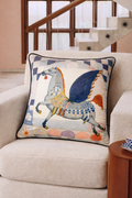 Blue and cream velvet cushion cover featuring a winged horse illustration with navy wings and pastel detailing, square cushion