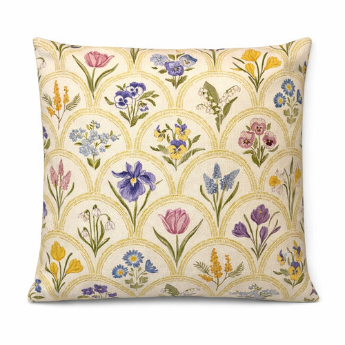 Cream square cushion with multicolour botanical flowers in a repeating scallop pattern