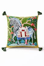 Green velvet cushion cover with illustrated zebra, decorative saddle and corner tassels