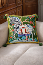 Green velvet cushion cover with illustrated zebra, decorative saddle and corner tassels