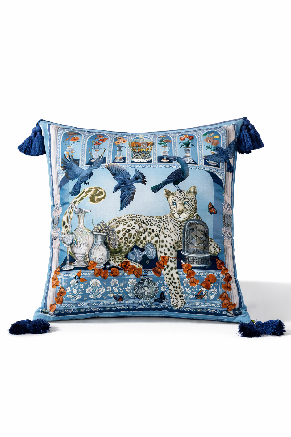 Square blue velvet cushion cover featuring a leopard, birds and decorative garden motifs with tassel corners